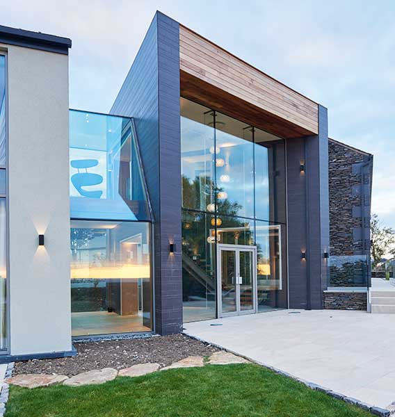 glass atrium to contemporary mixed material self build