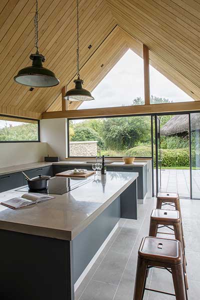 glazed gable in extension to stone home