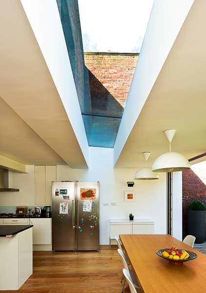 glazed link roof between old and new sections of a home
