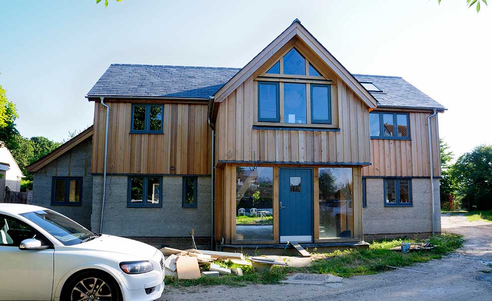 northern elevation of an oak frame home clad with cedar