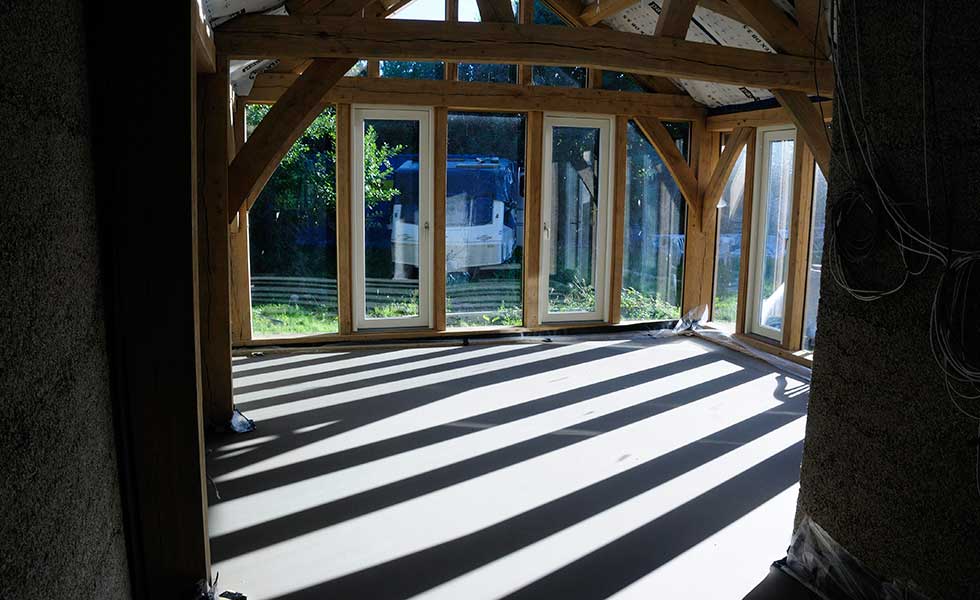 oak frame extension with glazing and screed floor