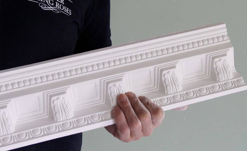 plaster coving in hand