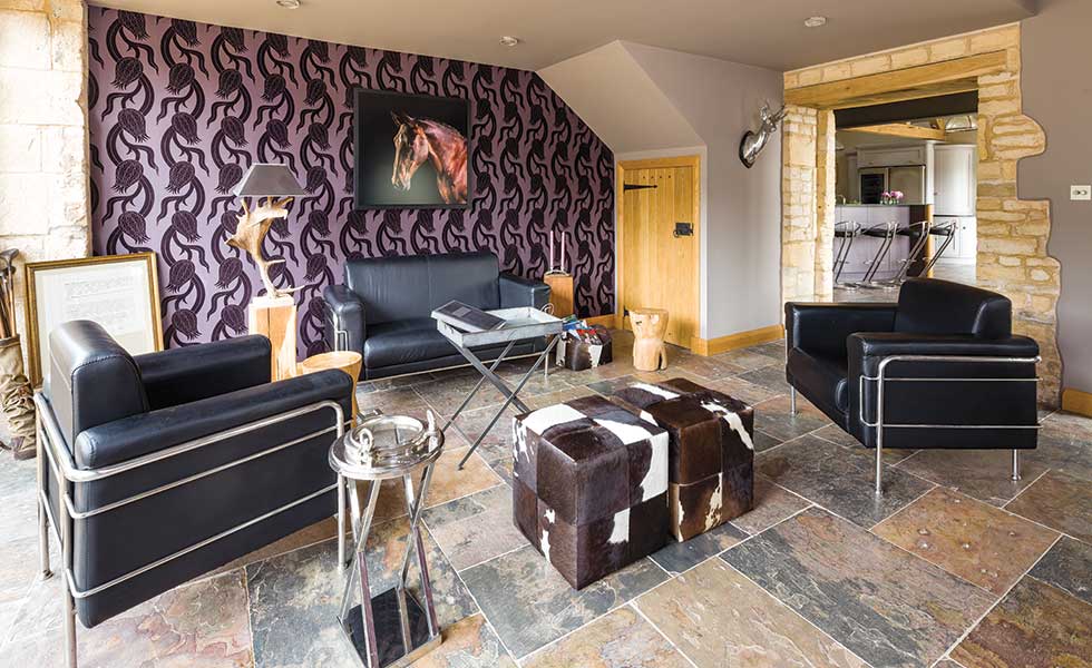 Barn conversion living room with slate floor
