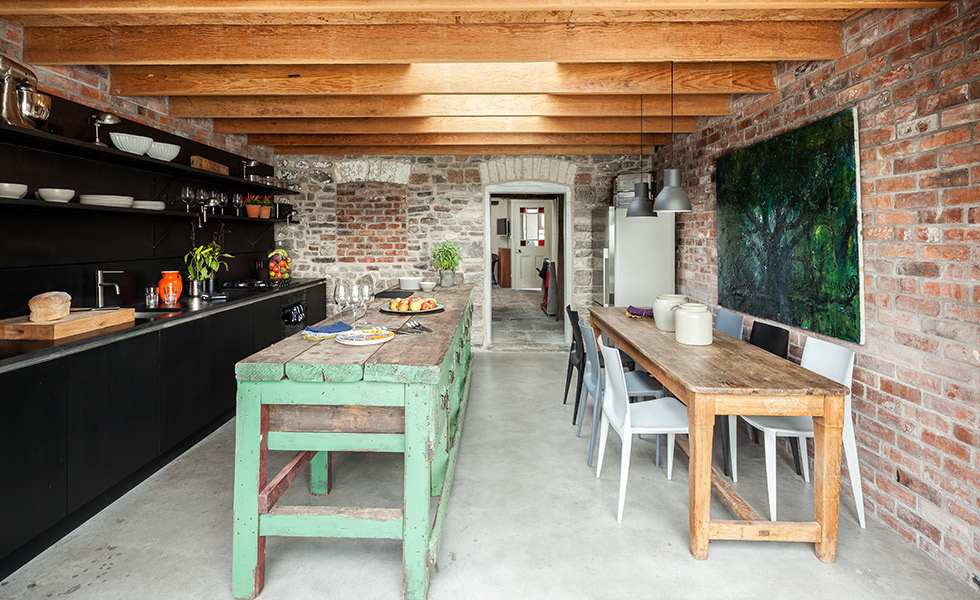 modern-extension-with-old-stone-cottage-wall-exposed