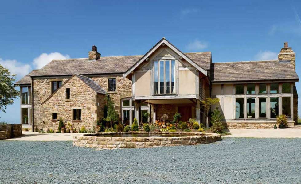 stone barn conversion with oak frame extensions