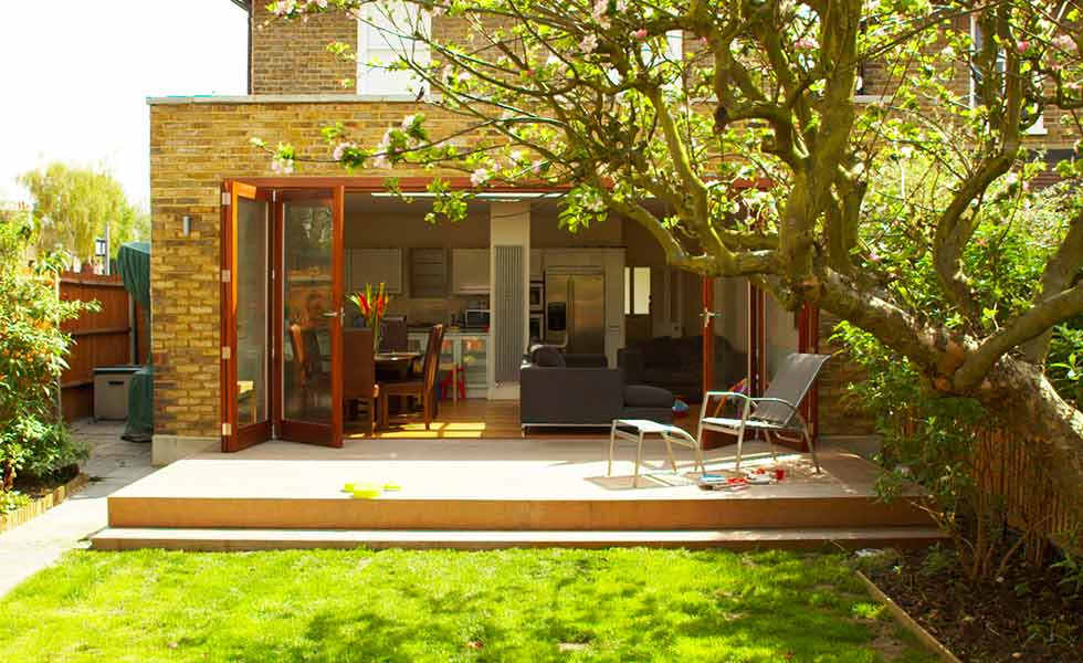 architect your home garden view bi fold doors decking
