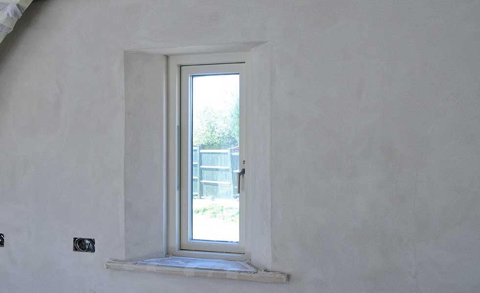 window reveal in a lime plastered hempcrete home