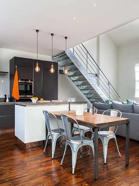 An industrial style has been adopted with stainless steel stairs