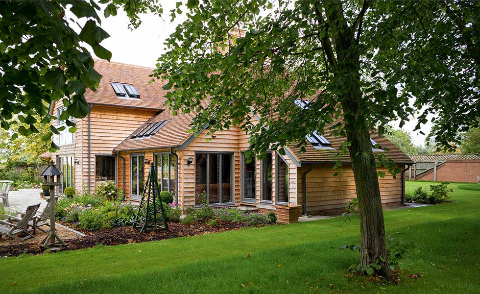 View of garden in oak frame self build