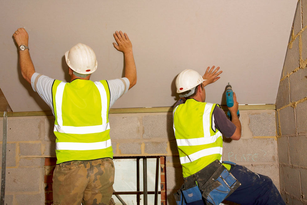 roof insulation boards being installed