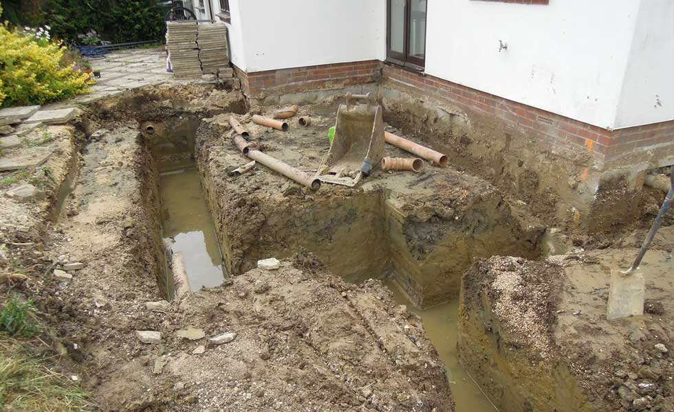 The trenches fill with water