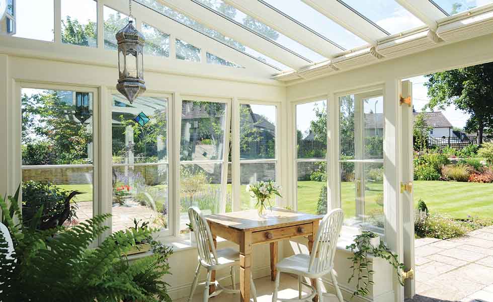 The fully glazed lean-to extension by David Salisbury creates a light-filled dining area