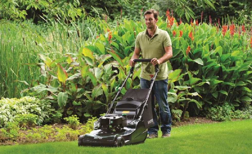 Chelford Farm Supplies man mowing