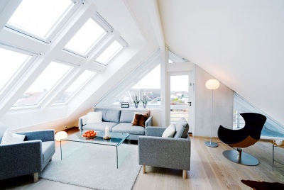 A bank of Velux windows helps to fill this loft conversion with natural light