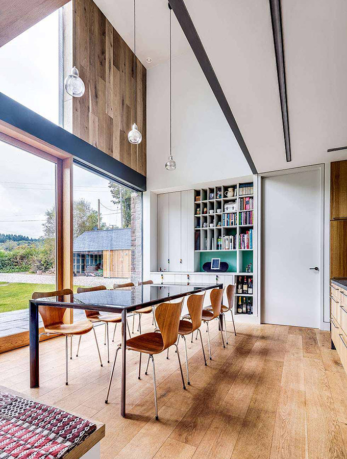 contemporary oversized doors in large barn home