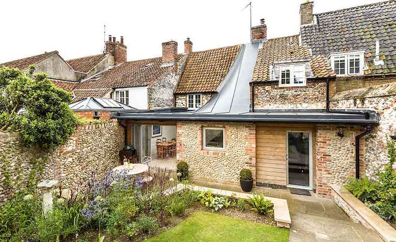 cottage extension with an interesting roof