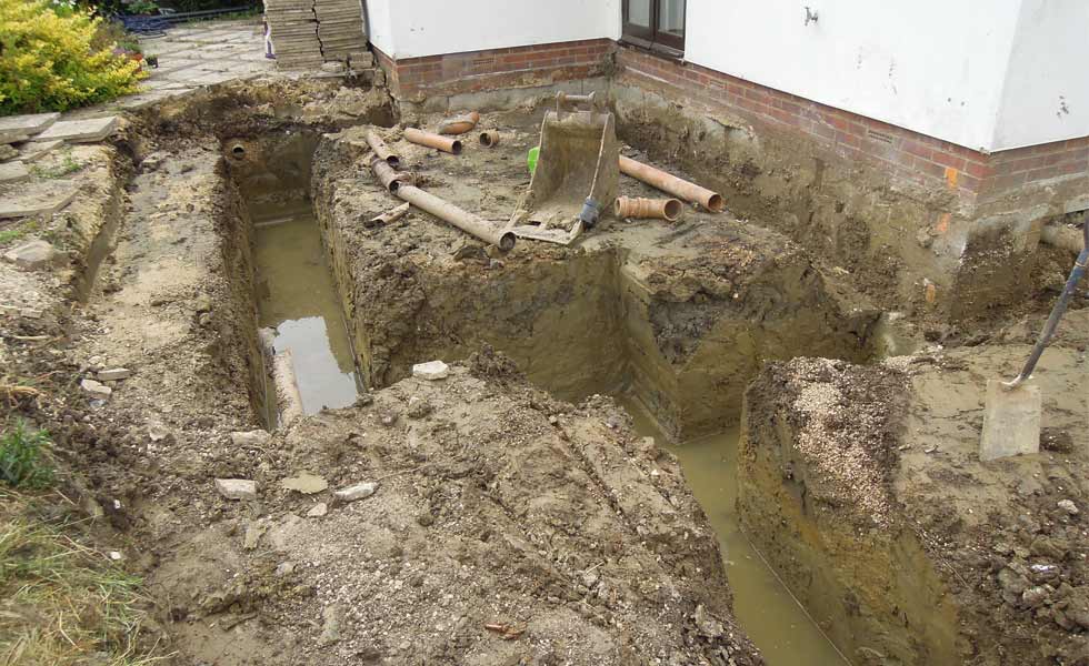 The trenches for the extension flooded