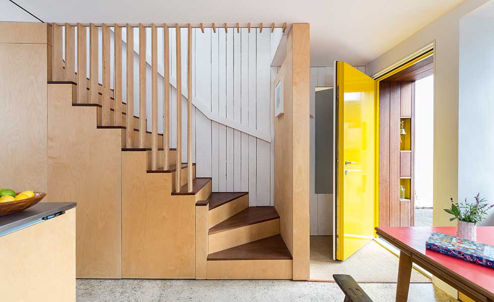 entrance hall, stairwell and kitchen of a tiny Passivhaus standard home