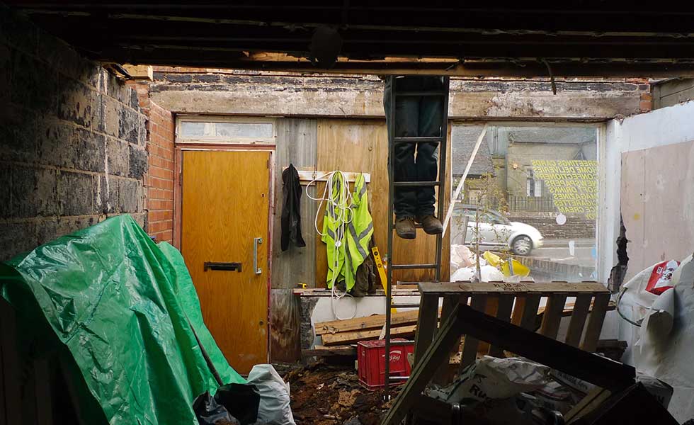 ripping out the fittings of a newsagents for conversion