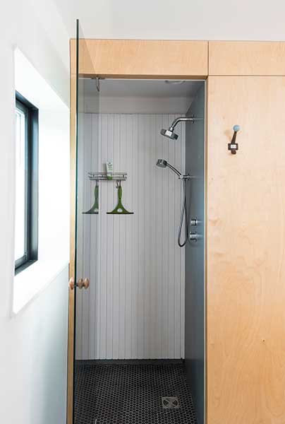 shower room with a glass door