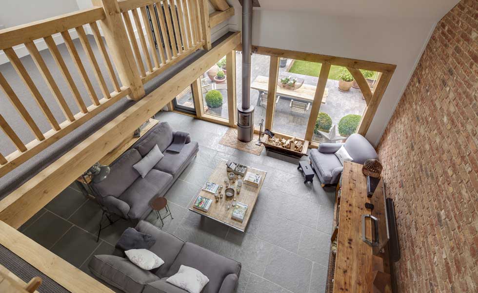 The living room benefits from the full height of the house