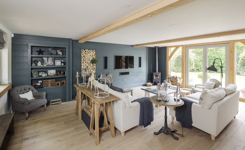 The house features a large sitting room - a space away from the kitchen area