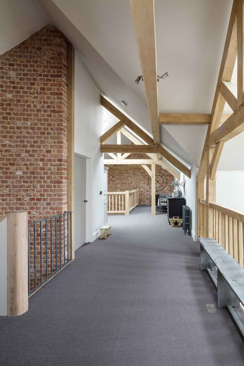 The generous landings on the first floor create a bright and airy space