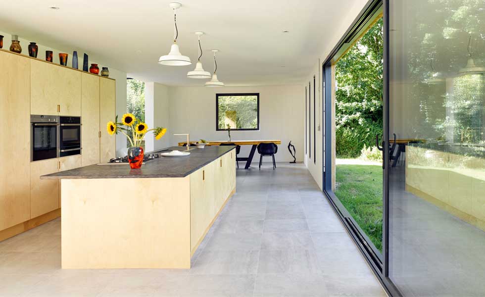 kitchen and sliding doors in CLT extension