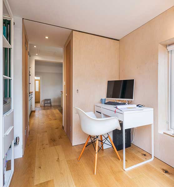 Study with plywood-clad walls
