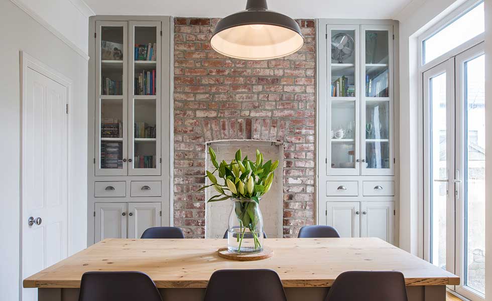 Dining room with exposed brick wall