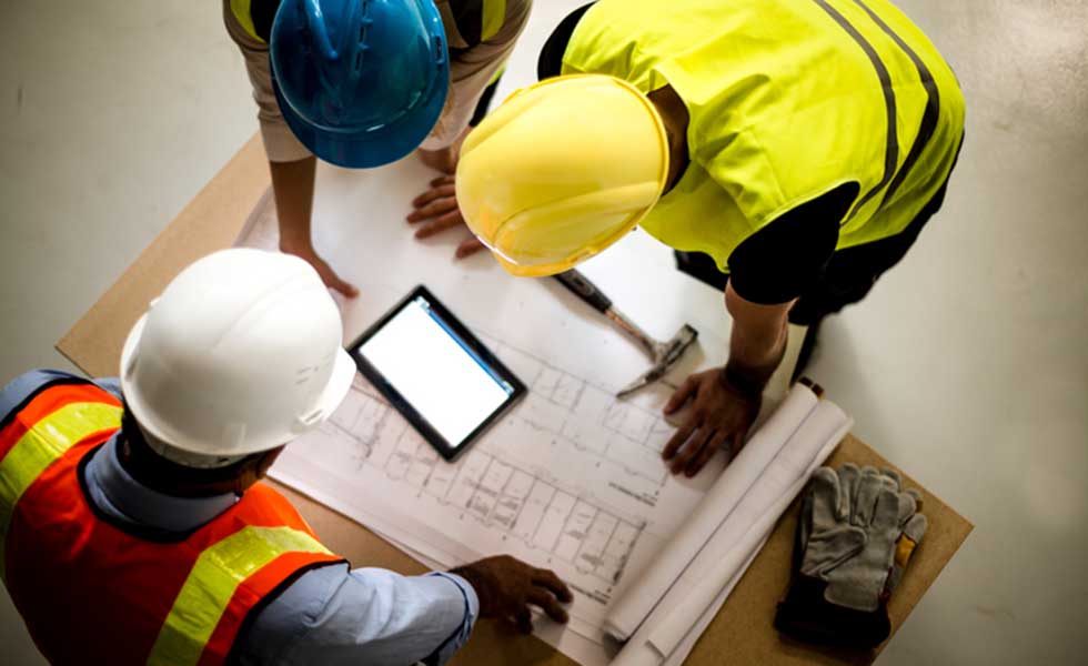 Builders and project managers on site
