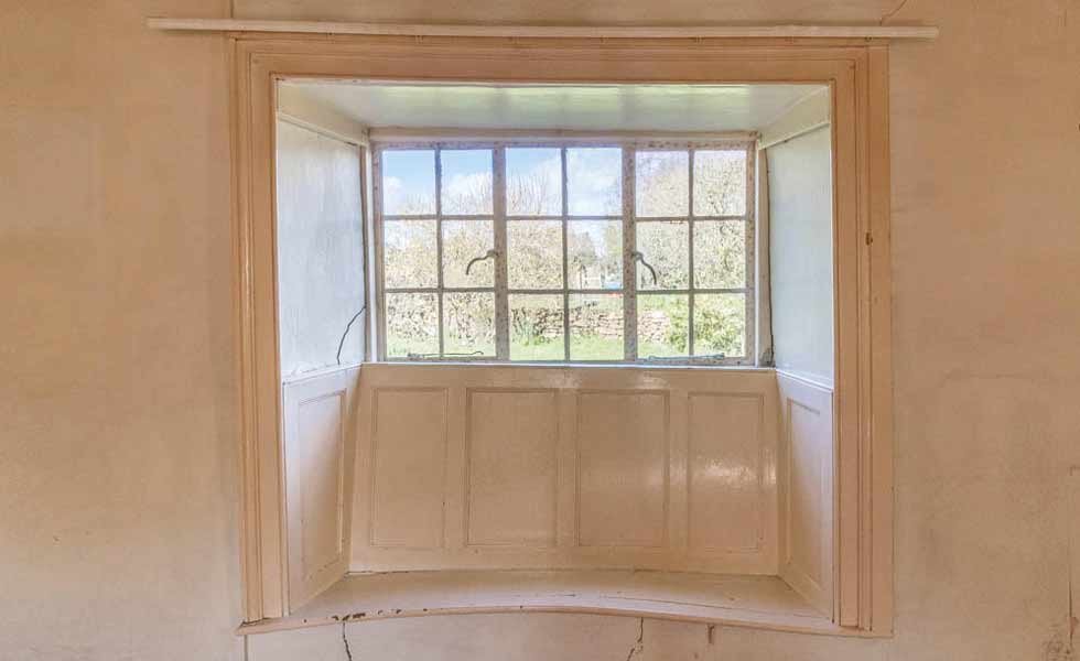 bowed window seat requiring structural repairs