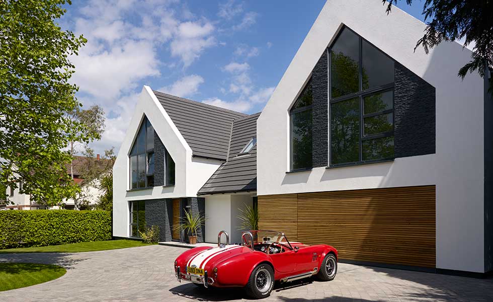 Contemporary white rendered bungalow remodel