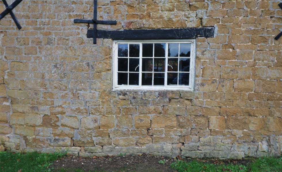 mabels farmhouse wall in need of structural repair