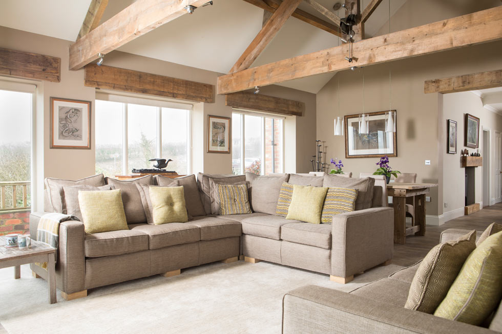 Living room with oak frame vaulted ceiling