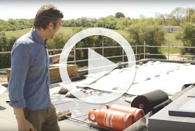 Charlie prepares his rooftop garden