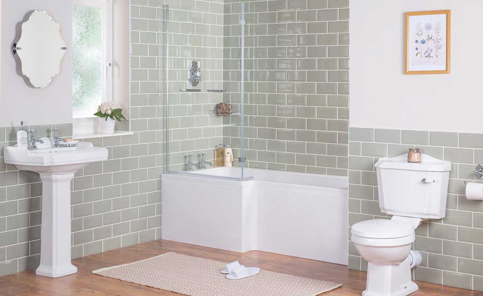 Fully tiled bathroom with shower bath