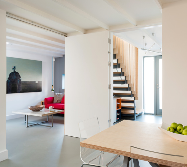 Open plan entrance hall with folding doors