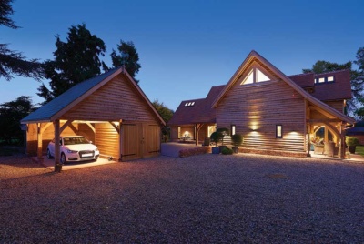 This outbuilding acts as a carport and store to the main house