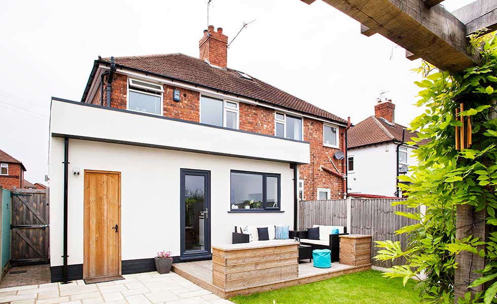 This 1930s home features a single-storey extension to house a new kitchen diner and offer the family with an improved living arrangement