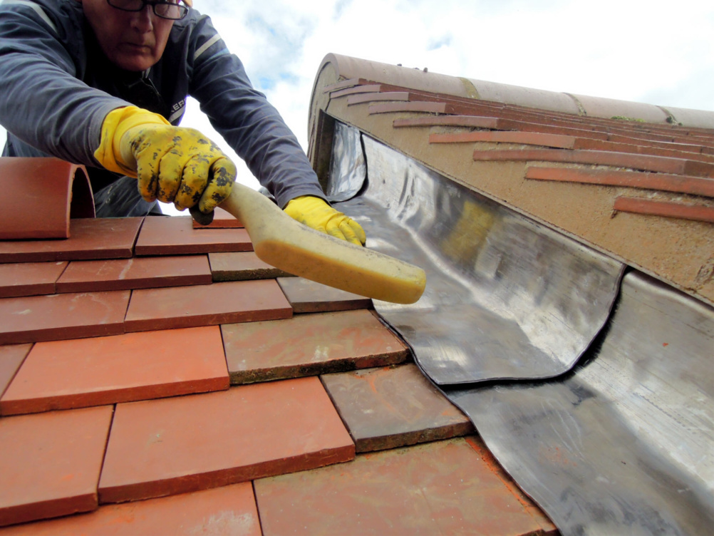 bossing of flashes on tiled roof