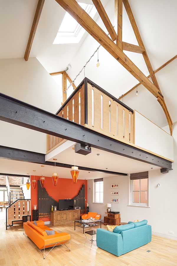 Double height living space with mezzanine office
