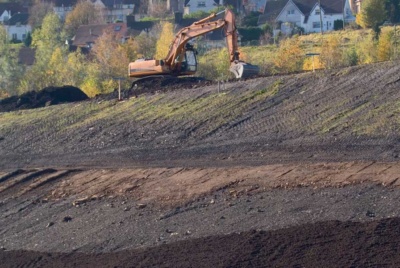 digger on contaminated land