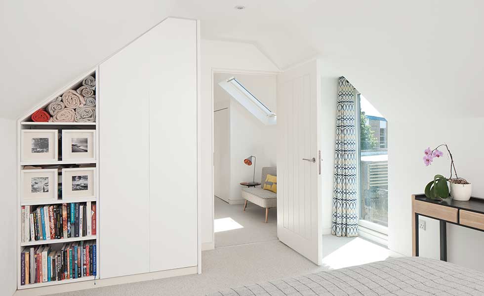 built-in-storage-in-bedroom-with-vaulted-ceilings