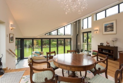 Corner bi-fold doors with integral blinds from Origin