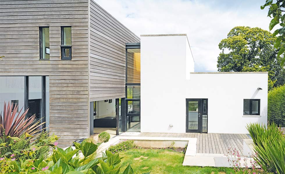 Contemporary self build with glass and render