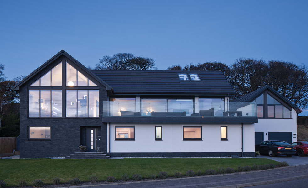 this timber frame house on the Scottish coast is filled with natural light