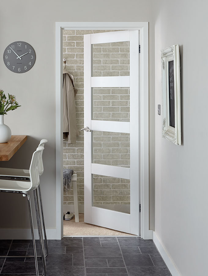 glass and wood panel door in kitchen