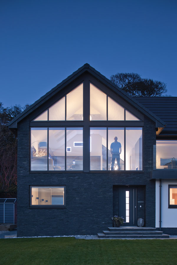 Upside down living - exterior elevation at night