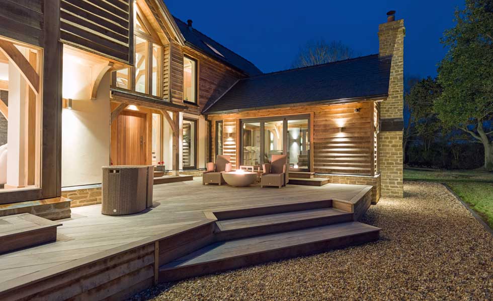 oak and stone cladding on exterior of oak frame forever home